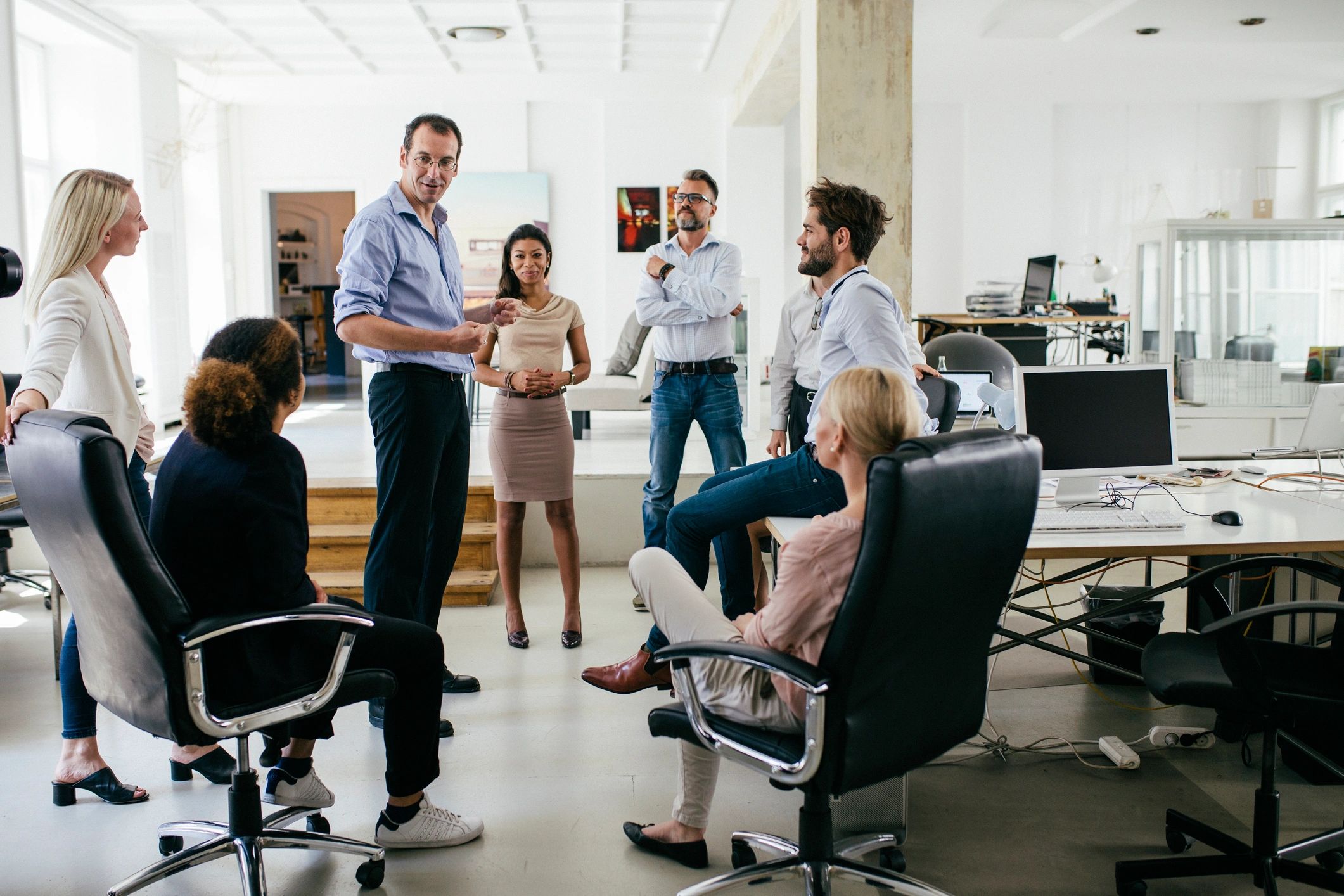 Professionals in a collaborative community meeting